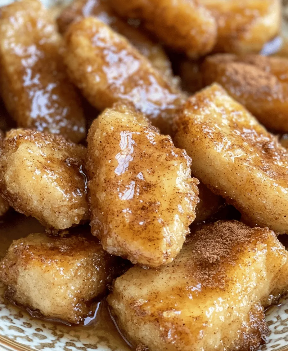 Fried bananas are a delightful treat that brings a tropical twist to any dessert table. With their crispy exterior and soft, sweet interior, these golden bites are elevated by a decadent cinnamon butter sauce that will leave you craving more. This dessert is not just a simple indulgence; it is a celebration of flavors and textures that can appeal to both children and adults alike. The combination of warm, crispy bananas and a rich, buttery sauce creates a dessert experience that is both comforting and sophisticated.
