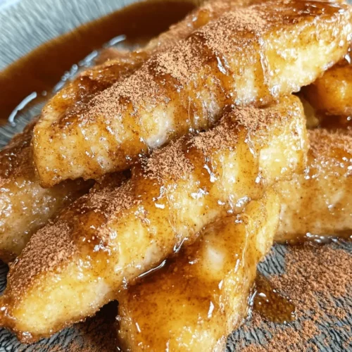 Fried bananas are a delightful treat that brings a tropical twist to any dessert table. With their crispy exterior and soft, sweet interior, these golden bites are elevated by a decadent cinnamon butter sauce that will leave you craving more. This dessert is not just a simple indulgence; it is a celebration of flavors and textures that can appeal to both children and adults alike. The combination of warm, crispy bananas and a rich, buttery sauce creates a dessert experience that is both comforting and sophisticated.