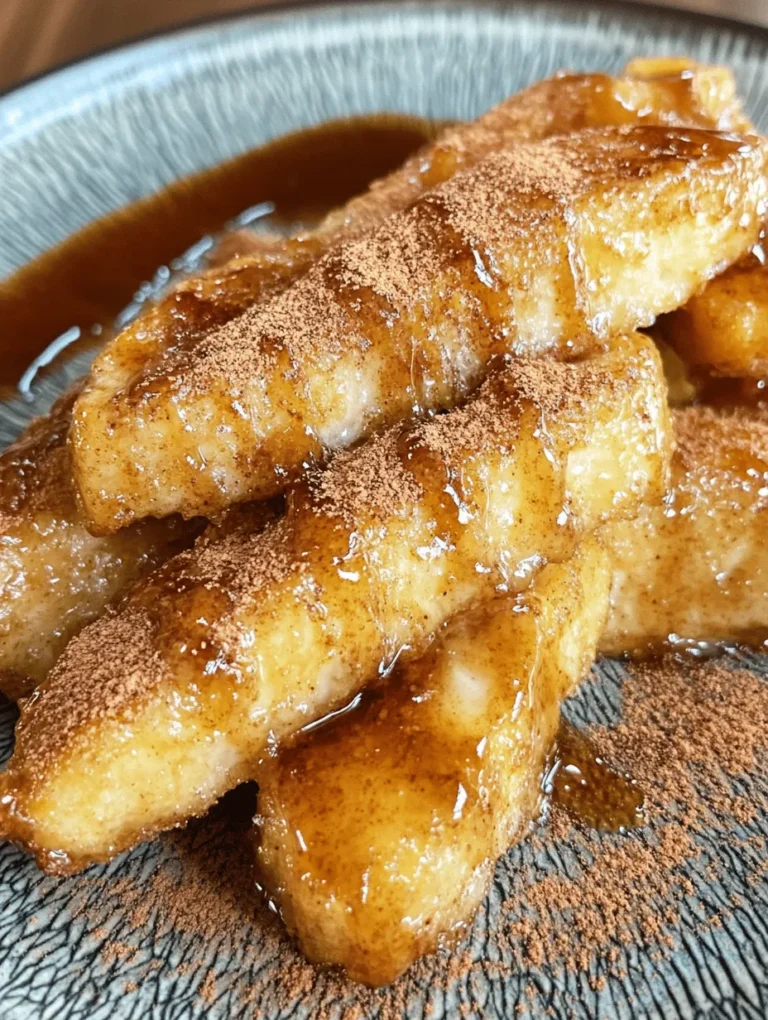 Fried bananas are a delightful treat that brings a tropical twist to any dessert table. With their crispy exterior and soft, sweet interior, these golden bites are elevated by a decadent cinnamon butter sauce that will leave you craving more. This dessert is not just a simple indulgence; it is a celebration of flavors and textures that can appeal to both children and adults alike. The combination of warm, crispy bananas and a rich, buttery sauce creates a dessert experience that is both comforting and sophisticated.